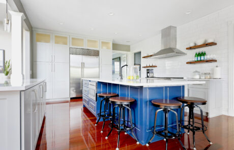 Kitchen Island with Blue Accent Cabinetry